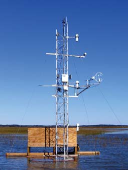 Flux tower set up showing the base enclosure for the battery bank