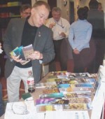 A participant admires LTER publications
