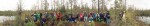 Writers and scientists pose for group photo at the Caribou-Poker Creek