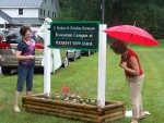 Amy and Becky Bormann unveil a sign at HBR