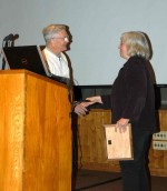 Barbara Benson receives an award from former LTER Chair, John Magnuson